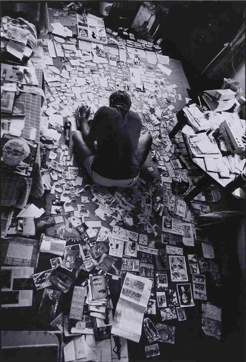 Peter Beard working on his 1971 Diary that burned in the windmill fire in Montauk